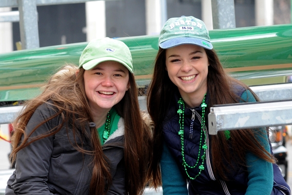 Mount St. Mary's High School sophomores Maggie Christy and Celia Rahill as all smiles on the West Side Rowing Club float during the annual St. Patrick's Day Parade. (Dan Cappellazzo/Staff Photographer)